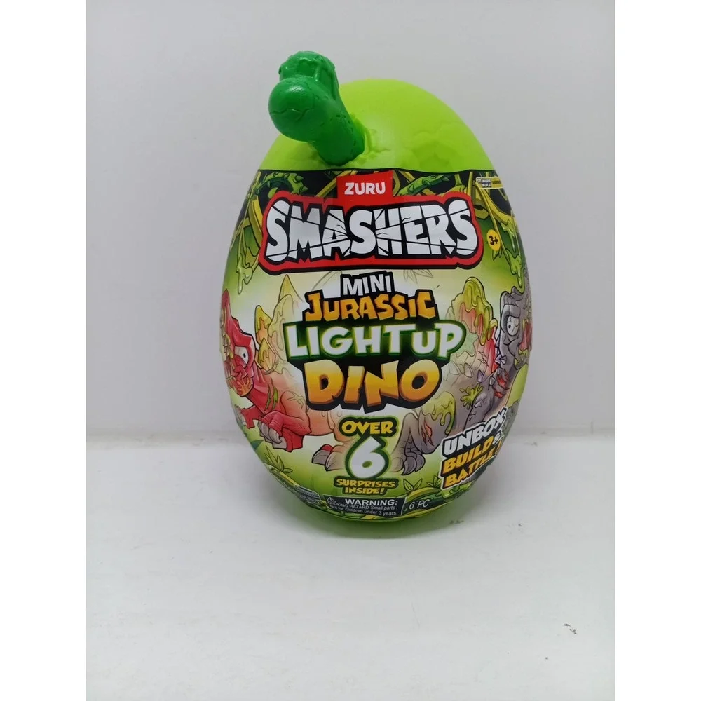 Zuru Smashers Mini Jurassic Light Up Dino Green Bone 6 Surprises Slime Egg ~NWT